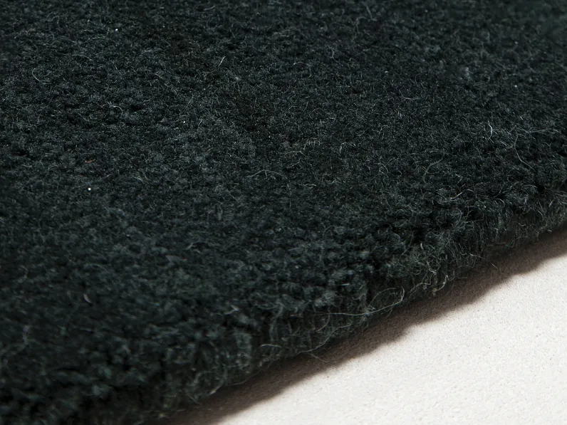 Tappeto tinta unita Calamandra realizzato in lana neozelandese e lana sarda di Poltrona Frau