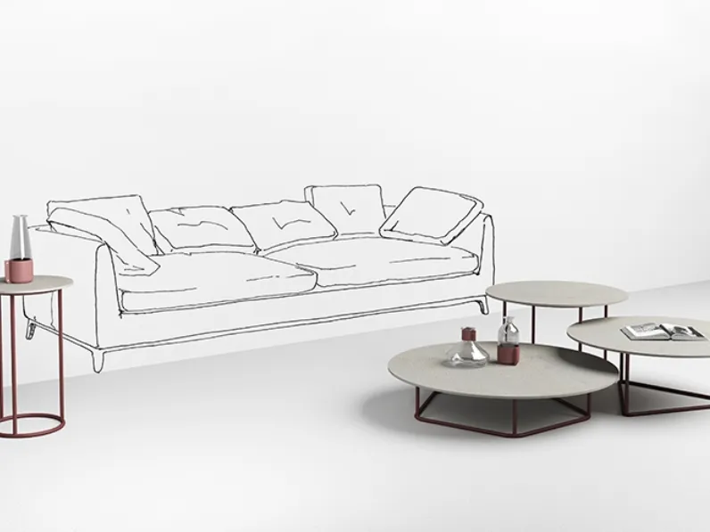 Tavolini con top in cemento bianco Circus di Minotti Italia