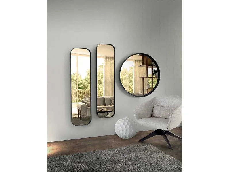 Specchio bronzato dalle diverse forme con cornice in metallo Ron di Pacini e Cappellini