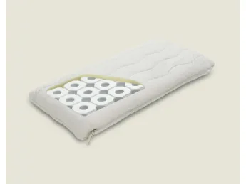 Il guanciale Zefiro di Dorsal offre un comfort unico con la sua forma a saponetta.
