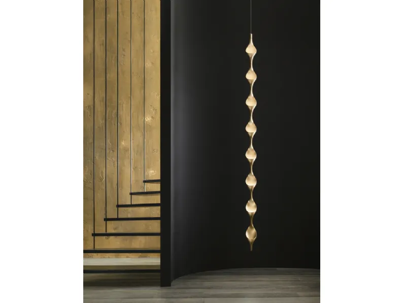 Lampada di design a sospensione Acqua, con elementi agganciabili grazie ad un innesto rapido, in alluminio pressofuso finitura oro Acqua di Cini&Nils