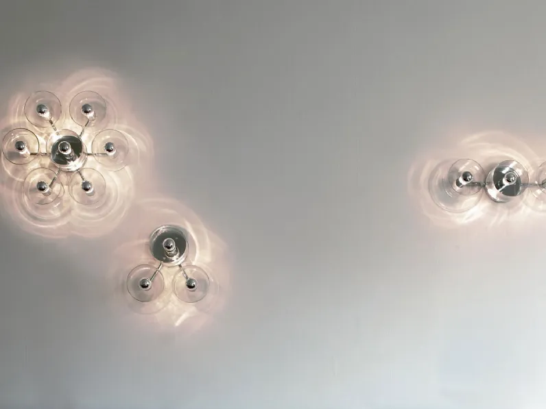 Lampada da parete in vetro soffiato trasparente e metallo cromato Fiore di Oluce