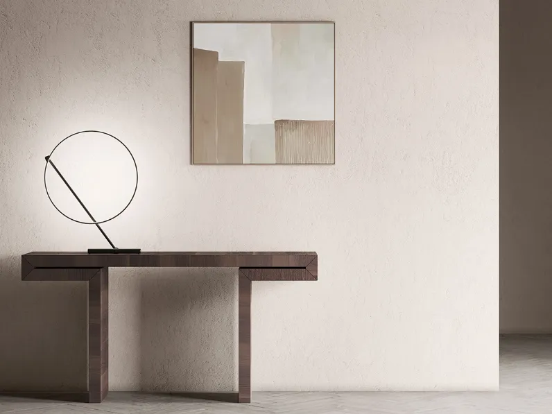 Lampada da tavolo caratterizzata da un cerchio di luce e un'asta di metallo sottili, leggeri e movibili fino a 320 gradi che danzano fra loro in configurazioni sempre diverse Poise di Kundalini