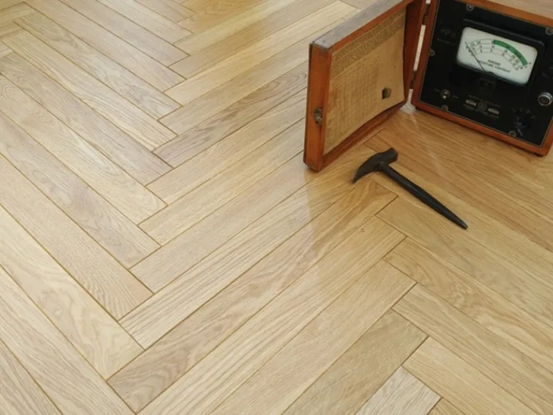 Parquet Castello in legno massello, posato a lisca di pesce di Milano Parquet