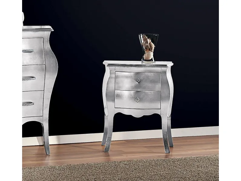 Comodino bombato a due cassetti con finitura in foglia 