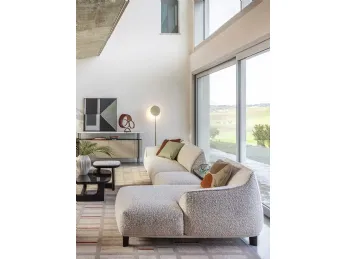 Divano Archibald Sofa System con penisola di Poltrona Frau