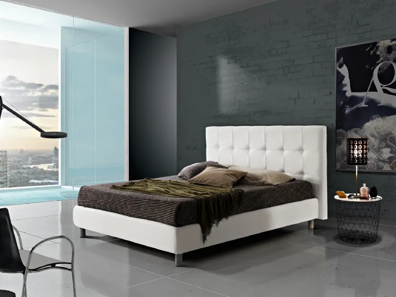 Letto Domino con testiera di Artigianaletti