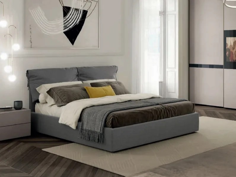 Letto in tessuto imbottito con testiera Dream di Artigianmobili