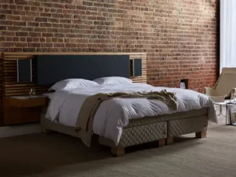 Letto Duxiana con testiera integrata per audio