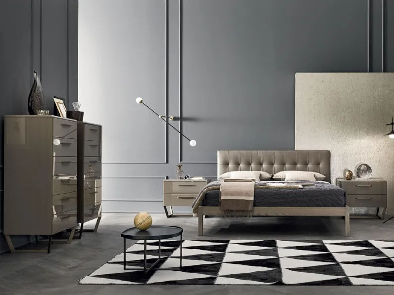 Letto Bic Capitonné in legno con testiera rivestita in ecopelle trapuntata di Ballancin