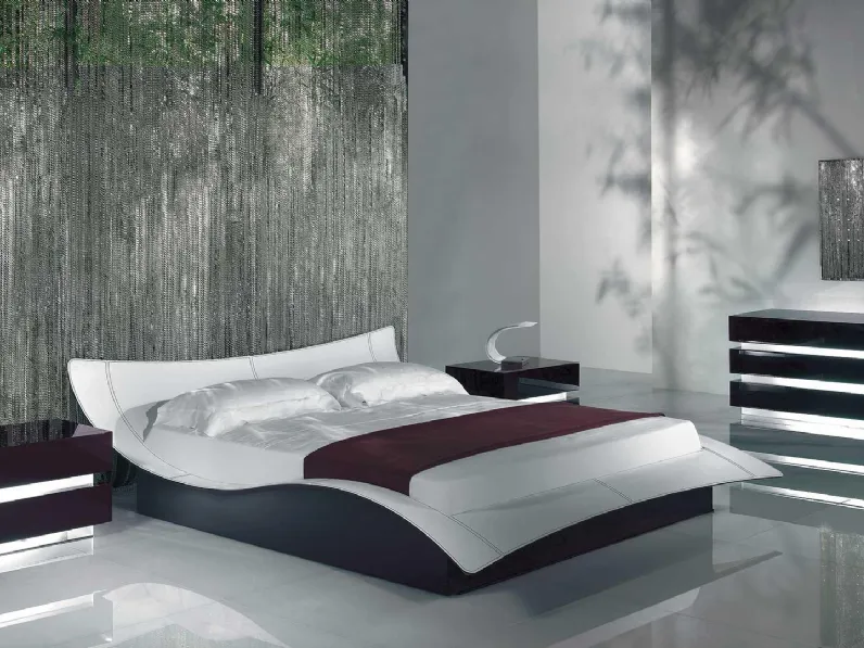 Letto di design sagomato in legno con rivestimento in pelle e base con contenitore Butterfly di Reflex