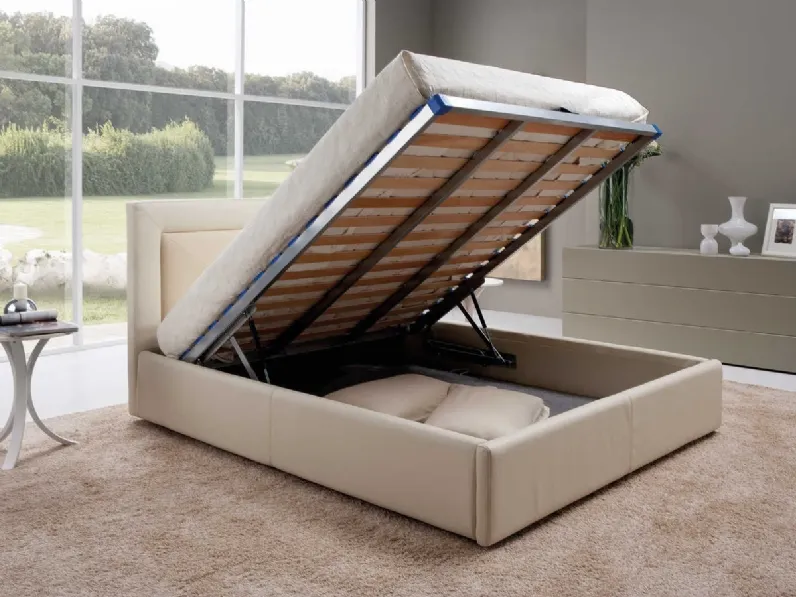 Letto matrimoniale in pelle imbottita con testiera e box contenitore Charme di Tancredi salotti