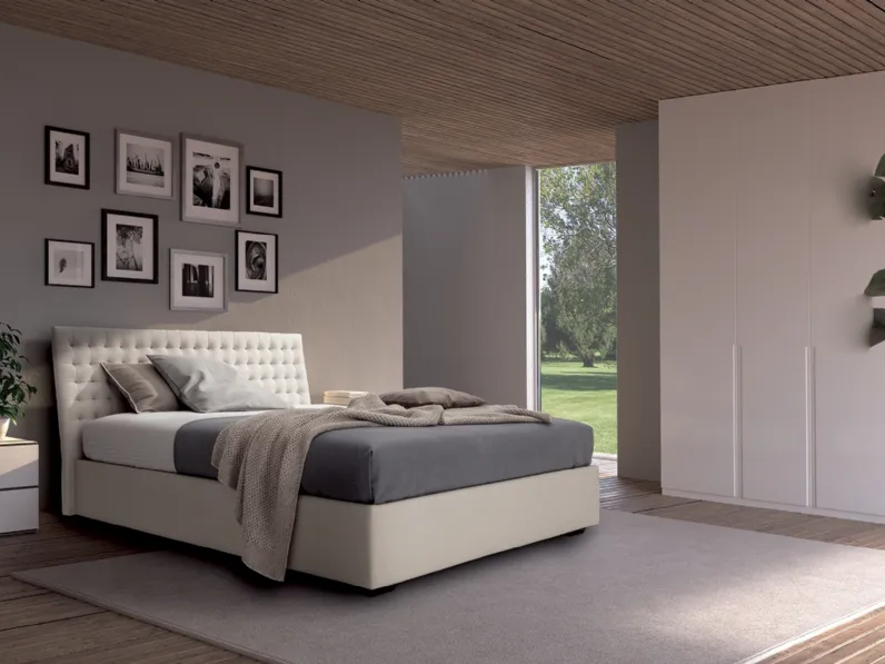Letto in pelle Eden con testiera sagomata lavorazione capitonné di Confort Line