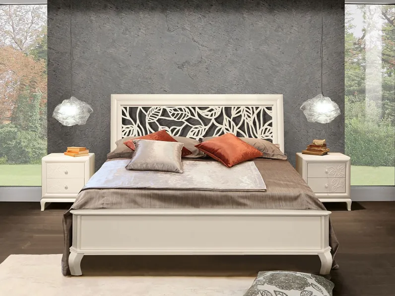 Letto Deco in legno con testiera traforata di Betamobili