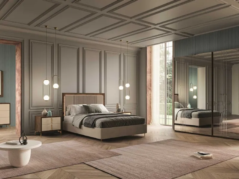 Letto con testiera imbottita trapuntata in velluto in armonia con la sua cornice bronzo Zara di Euro Design