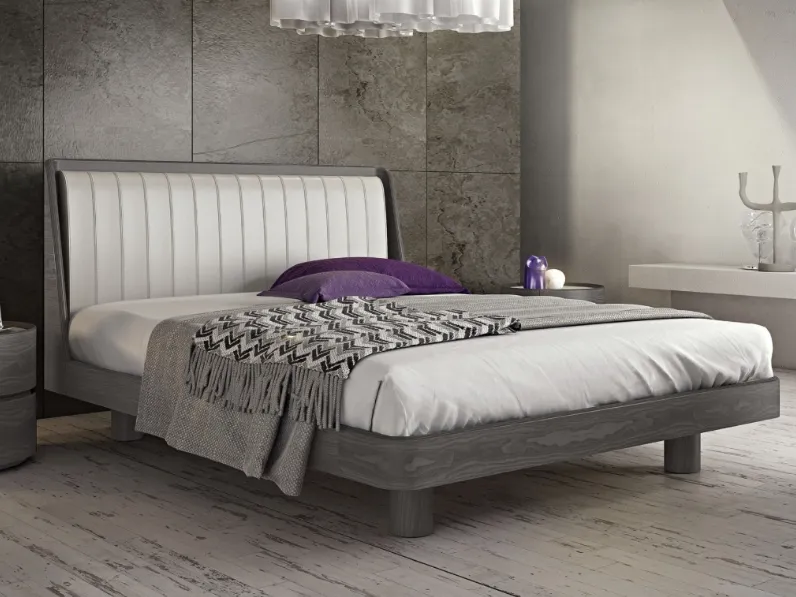 Letto con testiera in pelle Incanto di Fazzini