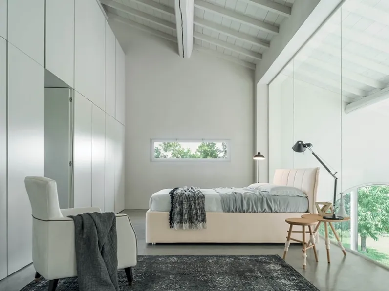 Letto matrimoniale con testiera trapuntata e box contenitore Giada di Rigosalotti