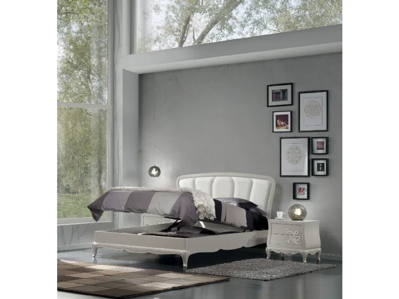Letto in legno con contenitore e testiera imbottita in ecopelle Iris di Euromobili