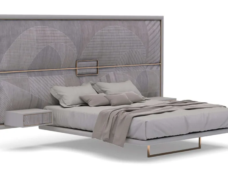 Letto con testiera importante in tessuto con dettagli in metallo Charm di Migliorino
