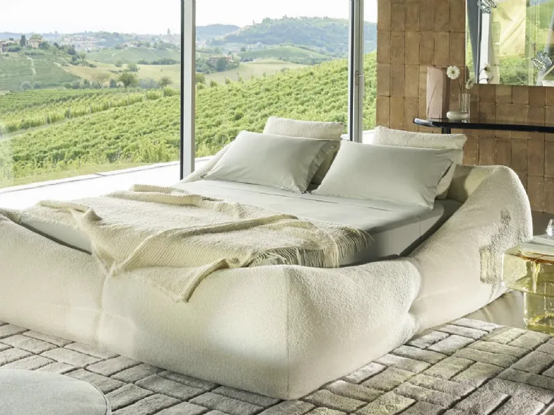 Letto imbottito Mon-Nid con box contenitore di Cassina