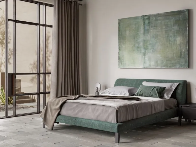 Letto in tessuto con testiera Diamante di Natuzzi