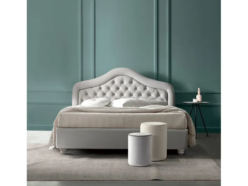Letto in pelle con testiera sagomata, imbottita e trapuntata capitonné Giada di Nefi Italia
