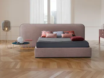 Il letto imbottito Elysium Laterale di Novaluna è un'opera di design elegante e confortevole.
