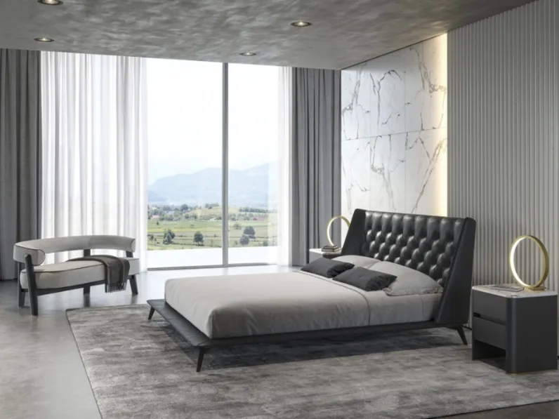 Letto Opera in pelle con testiera trapuntata di Vibieffe