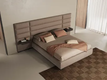 Il letto imbottito Tamigi di Novaluna unisce comfort e design moderno.