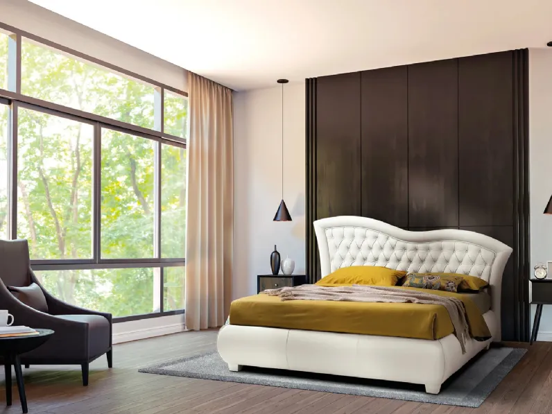 Letto con giroletto bombato e testiera lavorazione capitonné con cornice ondulata Vivaldi di Artigianaletti
