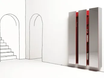 La libreria Ambrogio di Minotti Italia si distingue per il suo frontale a specchio.
