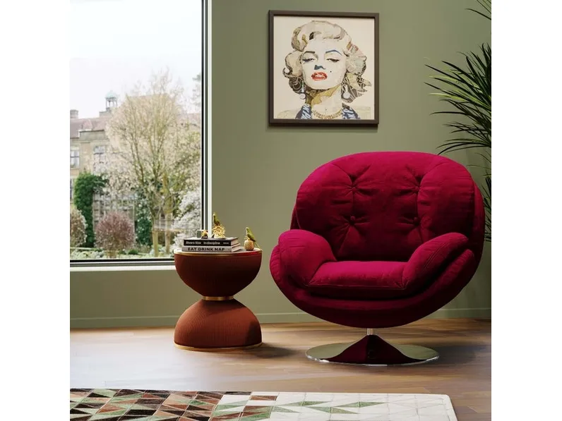 Poltrona Cosy con base in acciaio di Kare Design