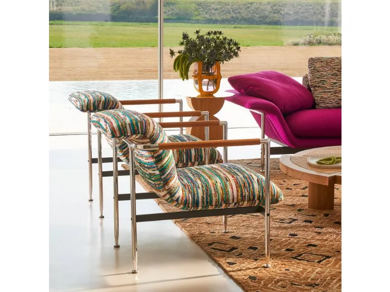 Poltroncina di design in tessuto Esosoft di Cassina