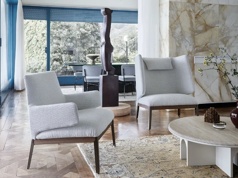 Poltroncine in tessuto Hug Low & High versions di Arflex
