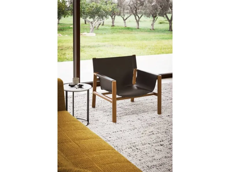 Poltroncina Pablo in legno massello rivestita in cuoio di B&B Italia