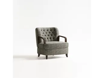 La Poltroncina Borgo di Tosconova unisce design raffinato e comfort, perfetta per ambienti eleganti.