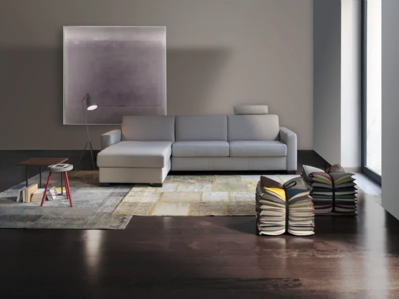 Divano Letto in tessuto con penisola contenitore Madonna di Calia