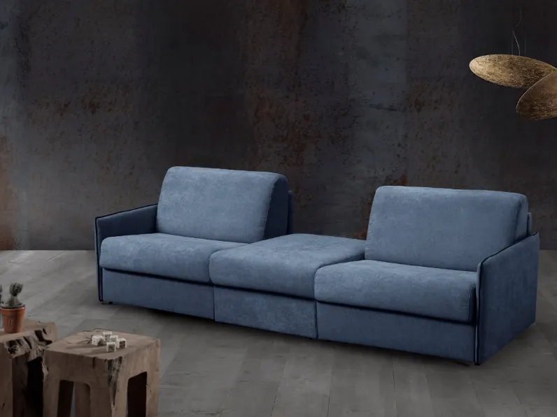 Divano Letto con due letti singoli e pouf centrale portacoperte Next di Excò