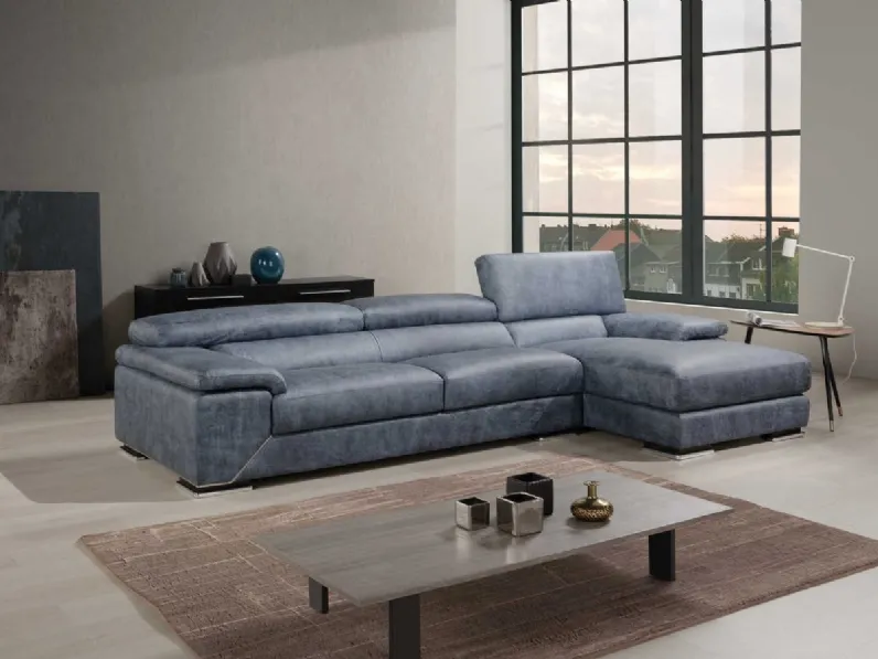 Divano in pelle con poggiatesta reclinabili e penisola Torino di Tancredi salotti