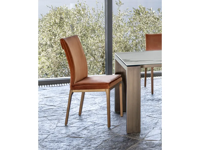 Sedia in pelle con schienale flessibile Cherie di Riflessi