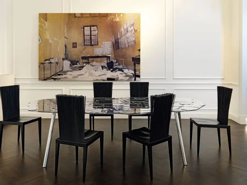 Sedia di design Jenette in poliuretano con schienale formato da un ventaglio di steli in PVC di Edra