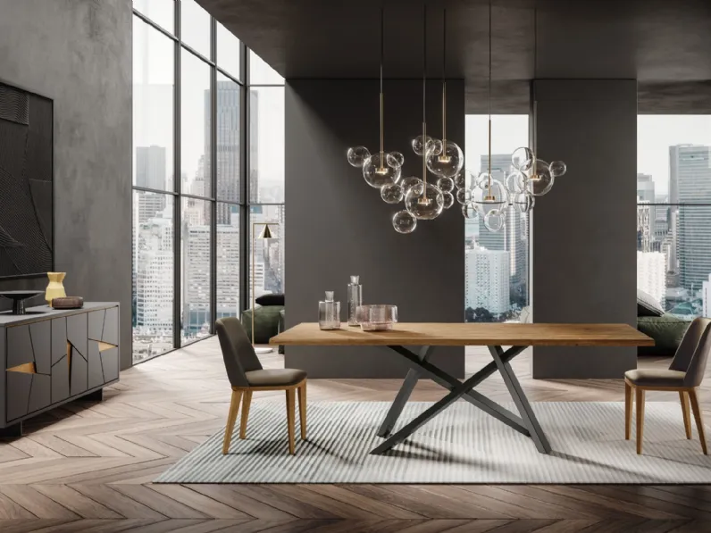 Sedia Nesty2 in pelle con gambe in legno di FGF Mobili