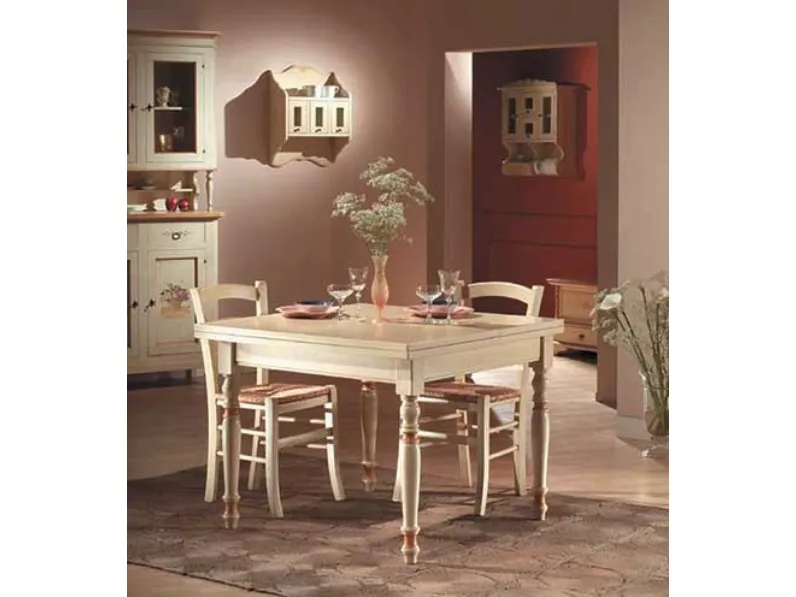 Tavolo apribile a libro, laccato con gambe tornite con finitura colore avorio e decori colore ocra 1303-A di Zanini