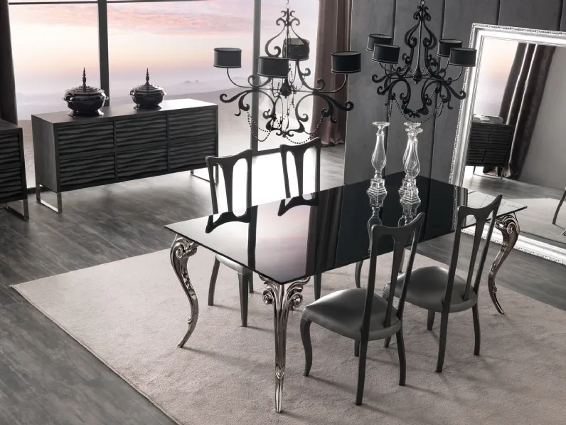 Tavolo rettangolare con top in vetro bronzato e gambe in alluminio pressofuso con dettagli floreali Antares di Cortezari