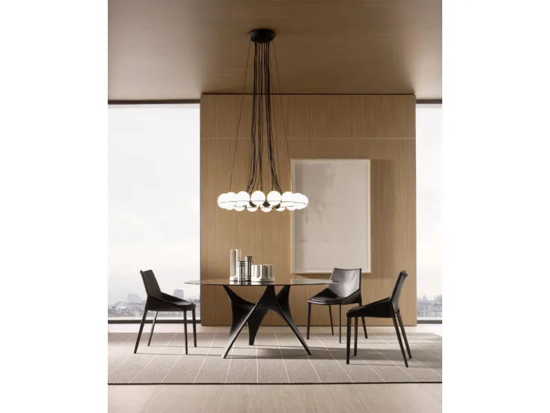 Tavolo rotondo con top in Vetro e base scultorea in Cemento Bronzo Arc di Molteni & C