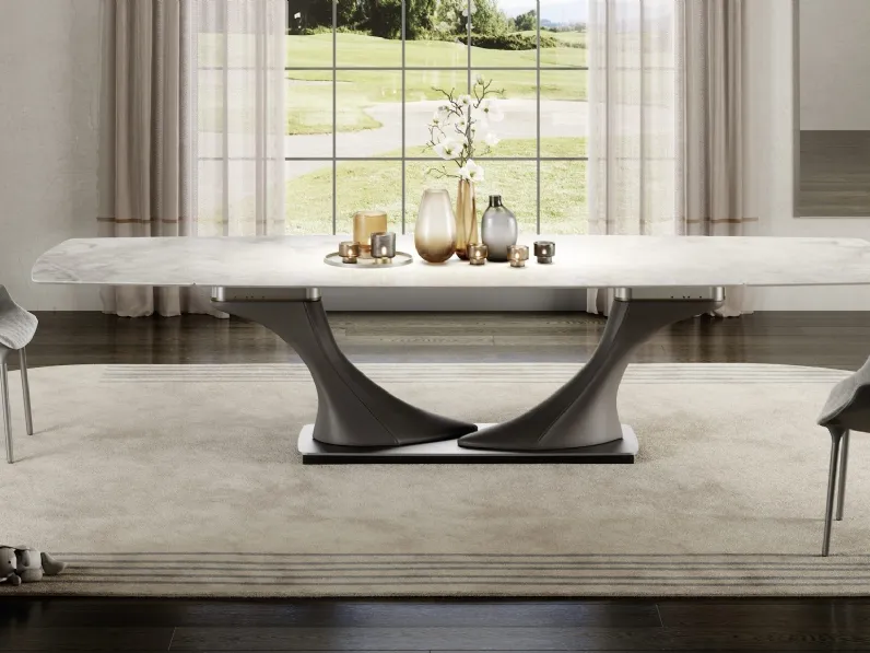 Tavolo allungabile con basamento rivestito in pelle e top in vetro marmo Archimede 72 di Reflex