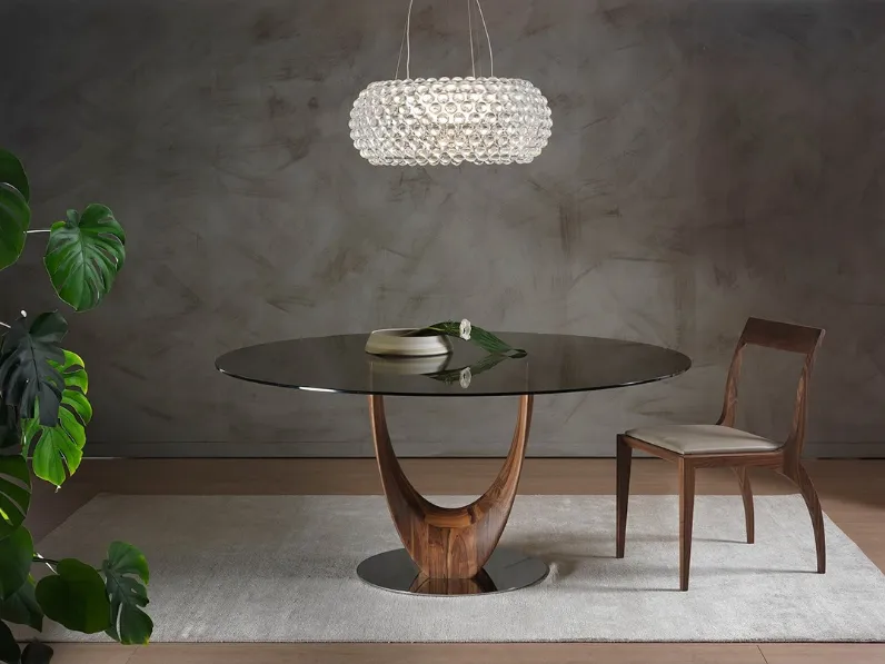 Tavolo rotondo Axis con top in vetro e base in legno massello di Pacini e Cappellini