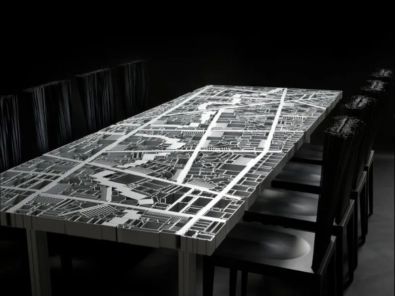 Tavolo rettangolare di design Baghdad Ispirato alla planimetria della capitale dell’Iraq costituito da centinaia di diversi profili estrusi d’alluminio, saldati artisticamente a mano in modo da formare una singola superficie totalmente traforata di Edra