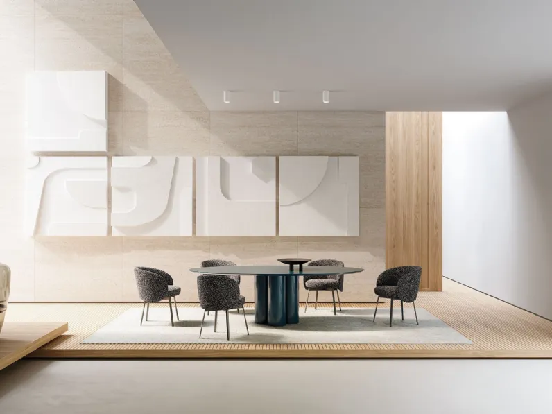 Tavolo rotondo laccato lucido con base formata da tre colonne Elly di Frigerio