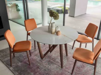 Il Tavolo Esse Round Wood di Compar Italia è un tavolo rotondo in legno.